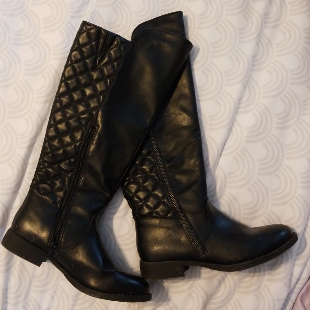 Tall black boots